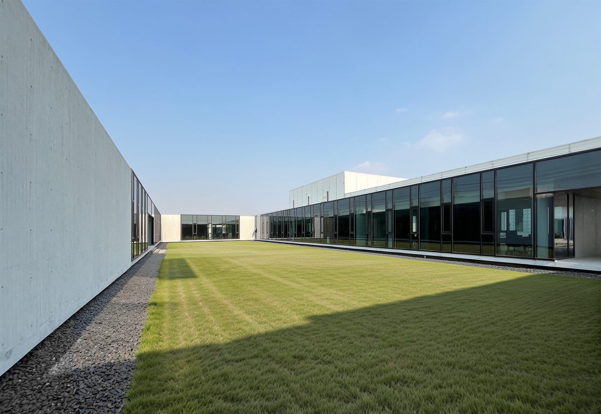 Lawn courtyard in the centre of the office, Shihlien battery plant