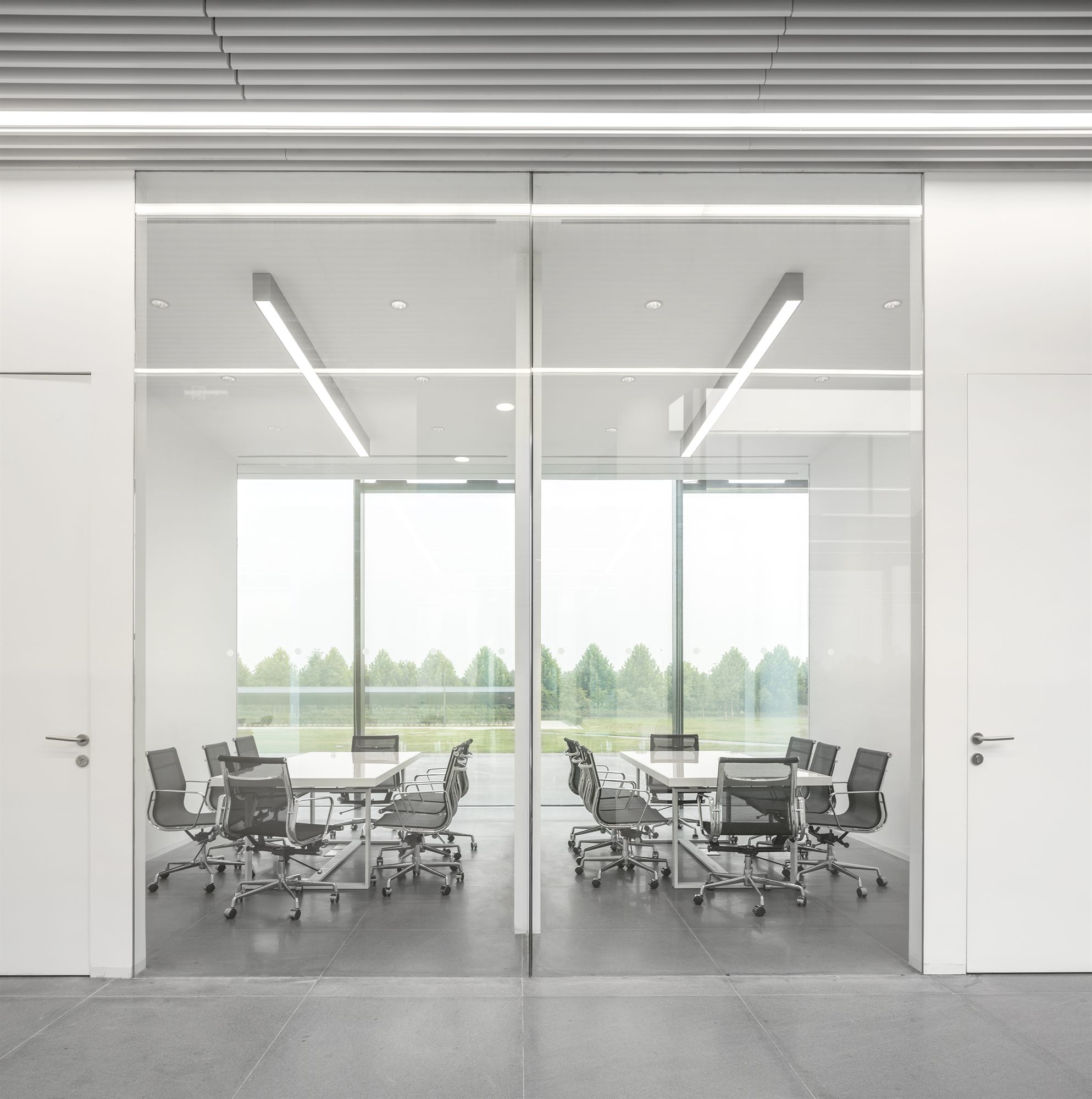 Glass-walled meeting room inside the Donghai office building