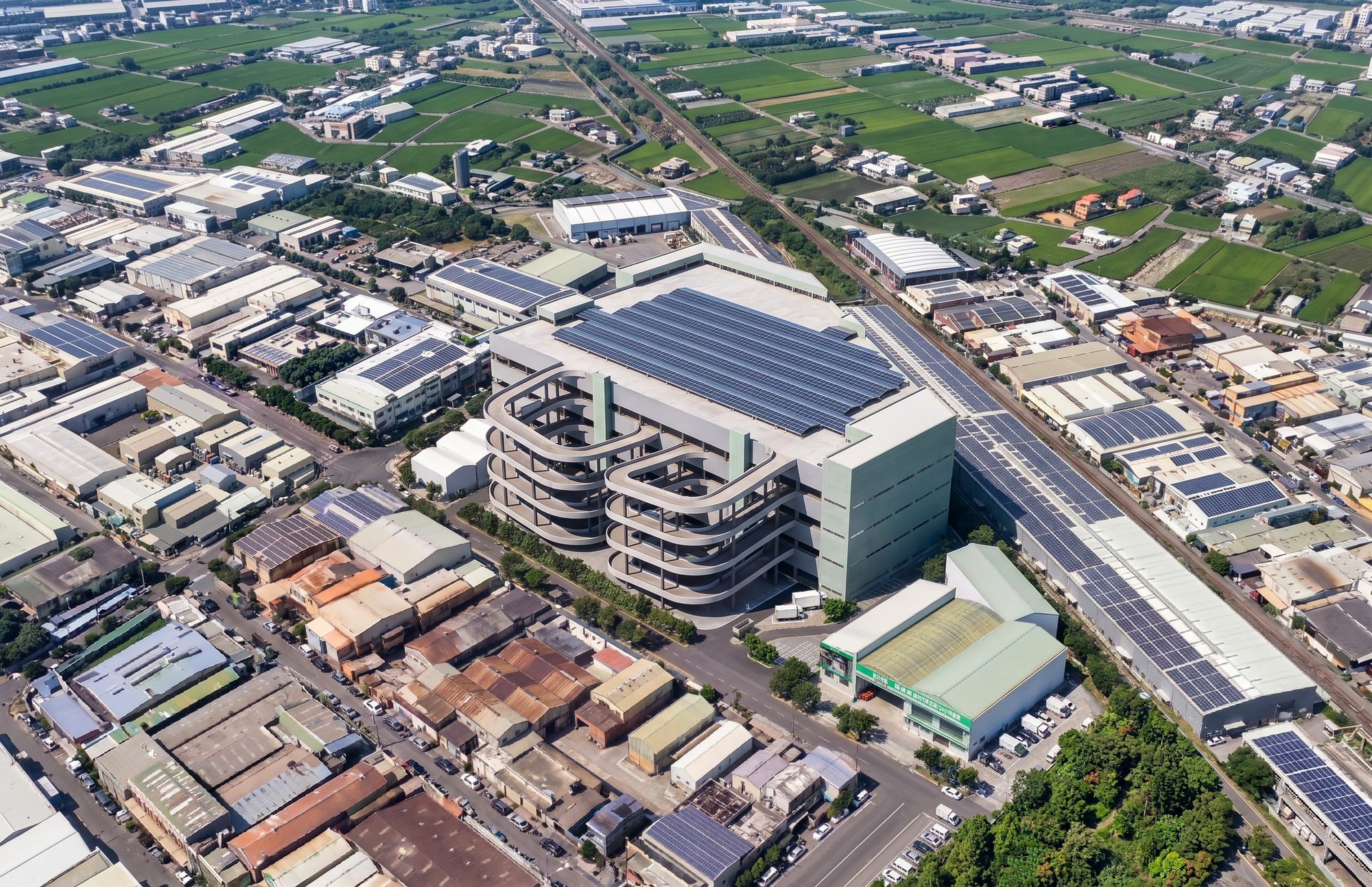 Rendering: aerial view of the logistics centre in its industrial setting, Taichung