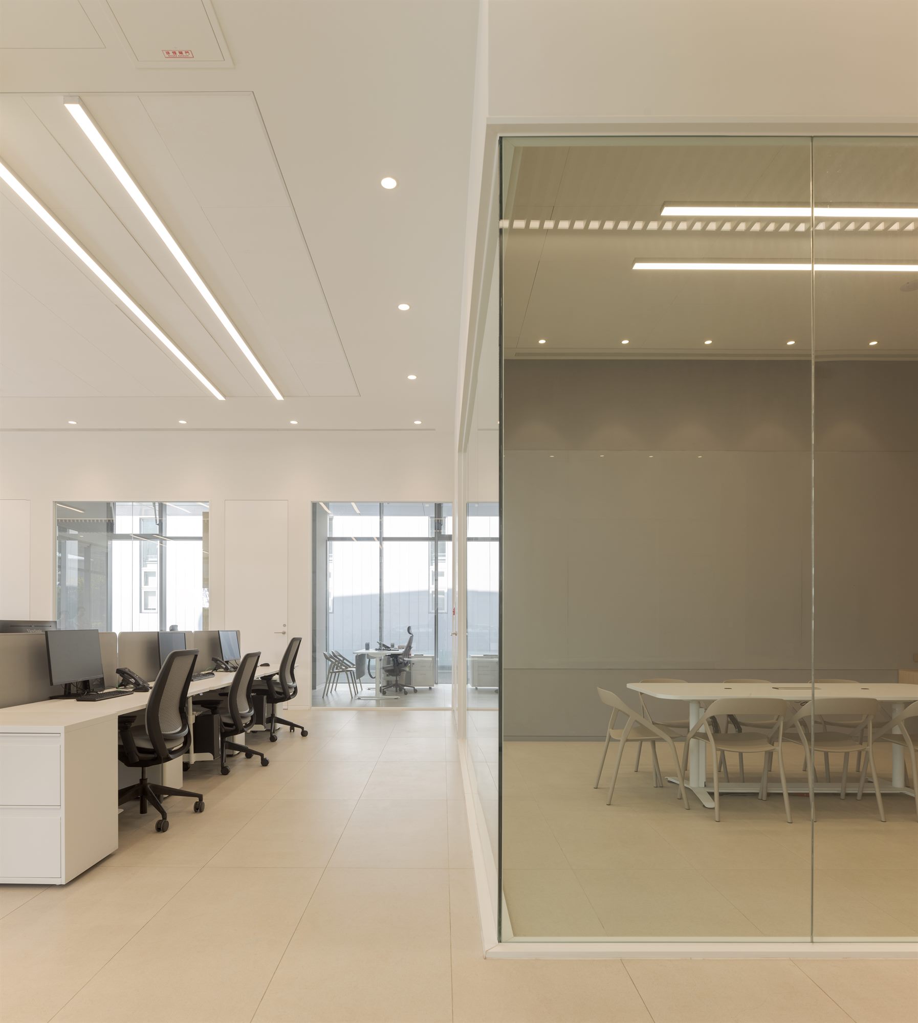 Office area with glass-walled meeting room, Quest Composite