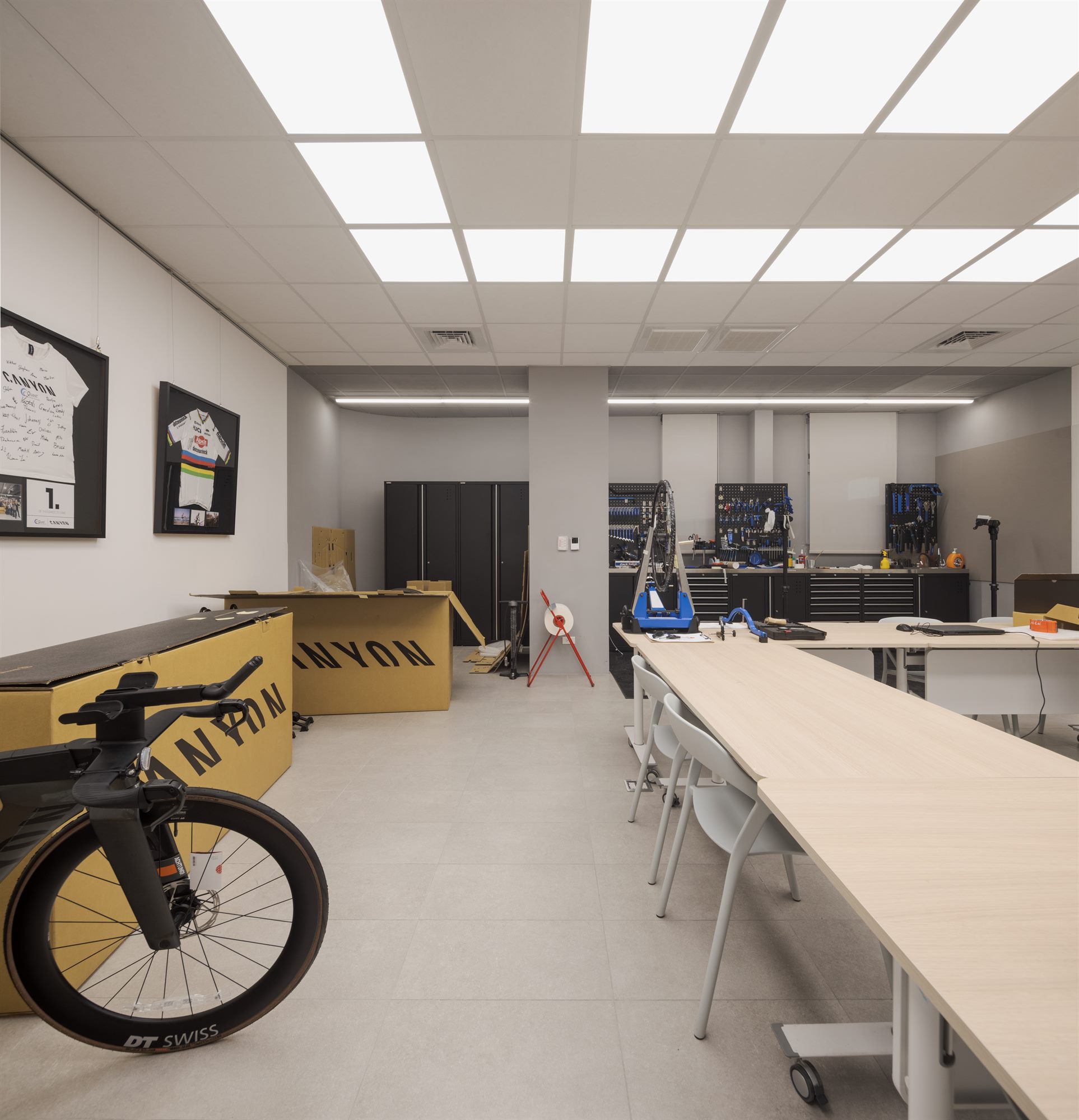 R&D workshop with bicycles and workbenches, Quest Composite
