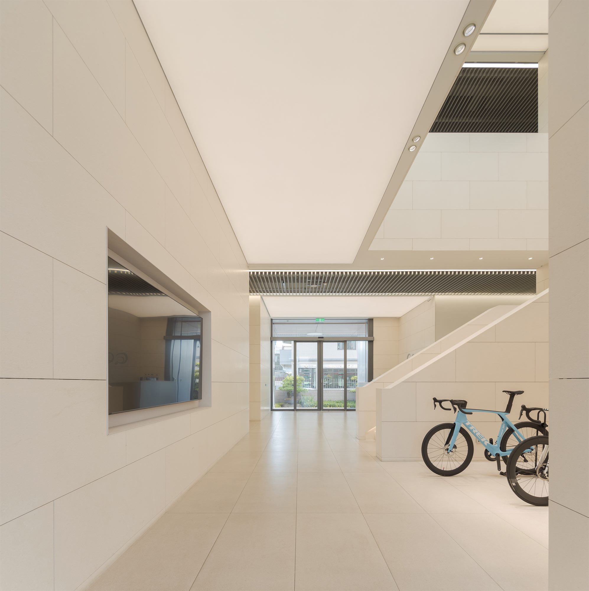 Double-height atrium with bicycle display, Quest Composite office
