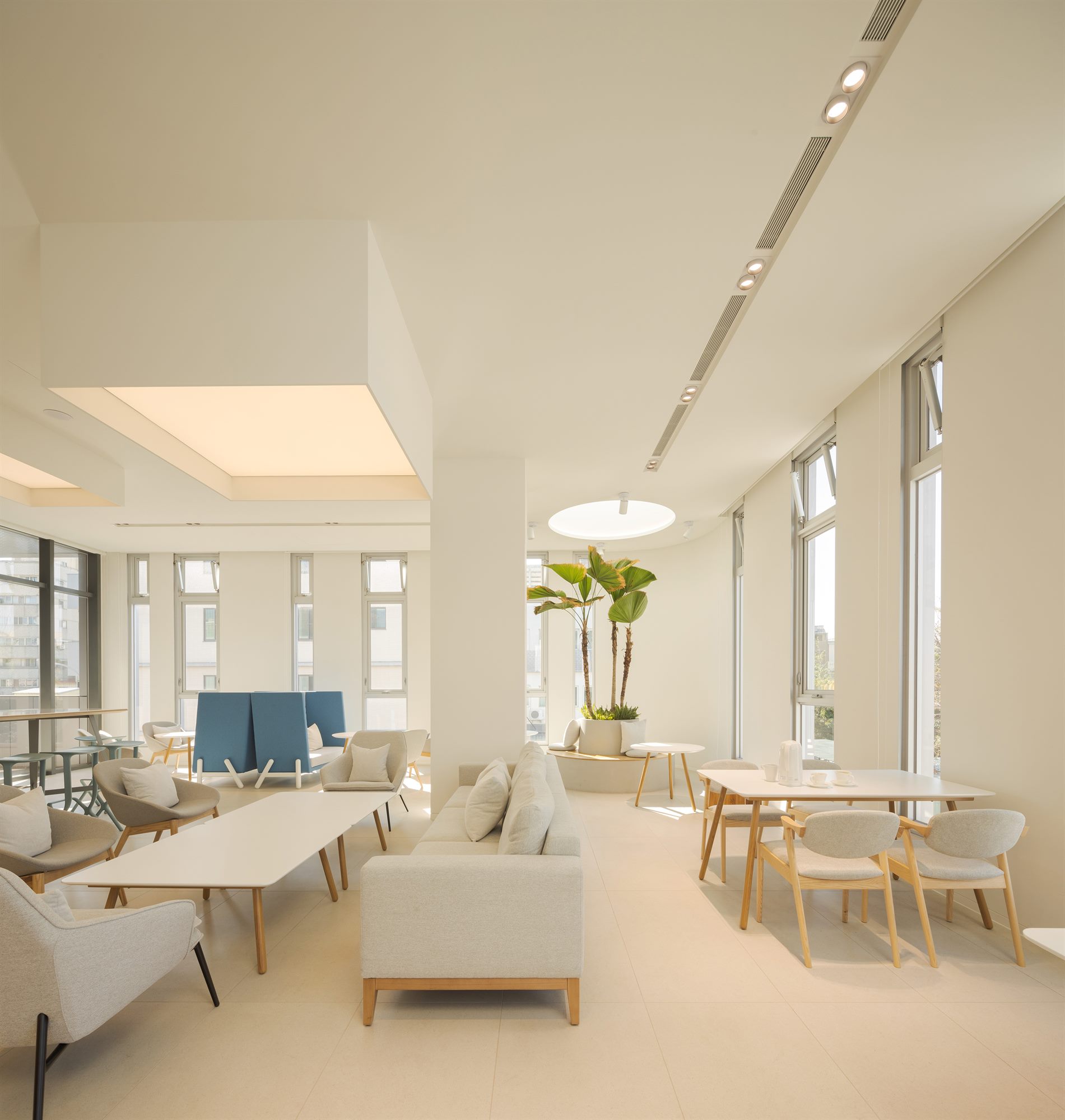 Staff lounge with sofas and plants, Quest Composite office