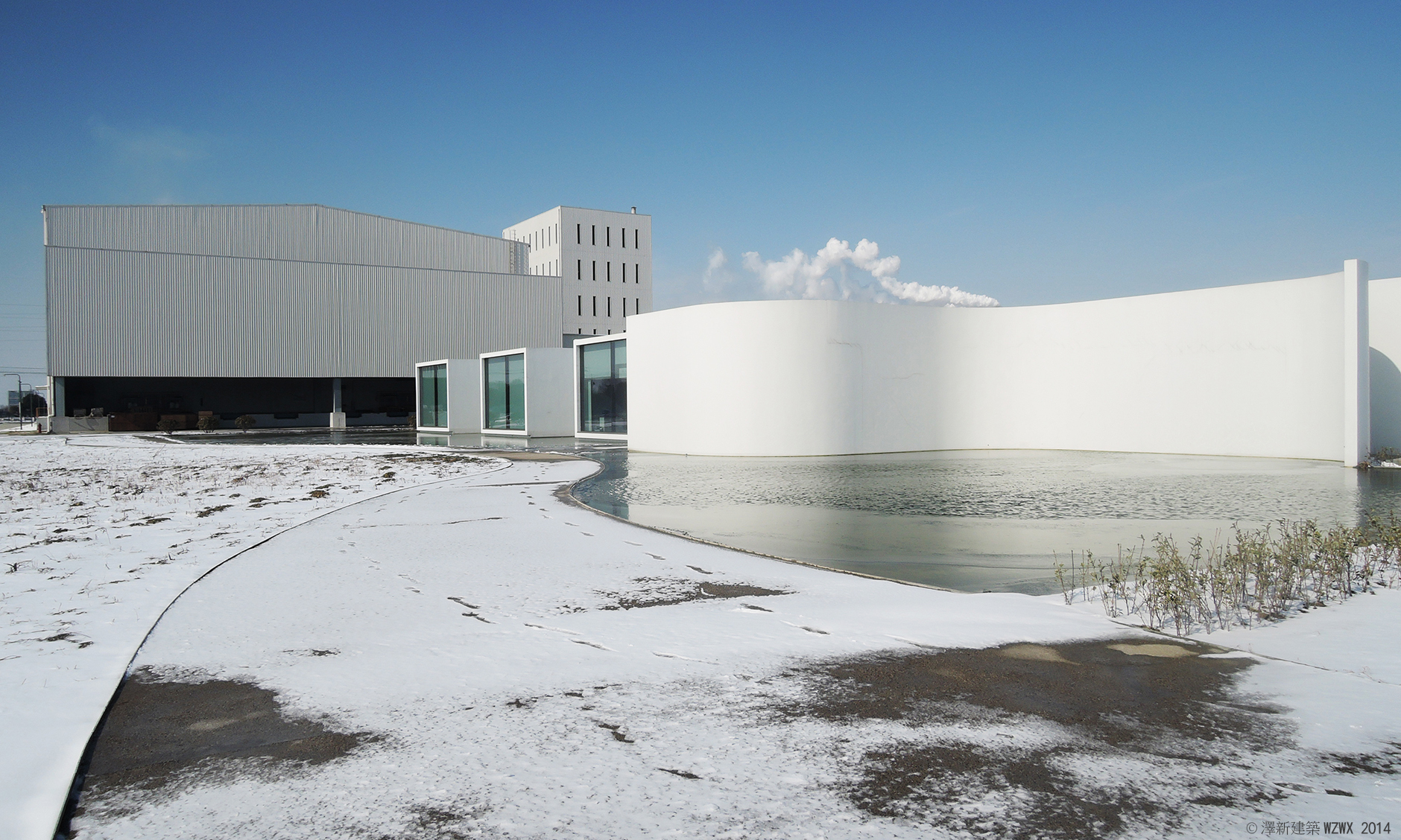 Curved white walls of the salt laboratory in winter snow, Huai'an