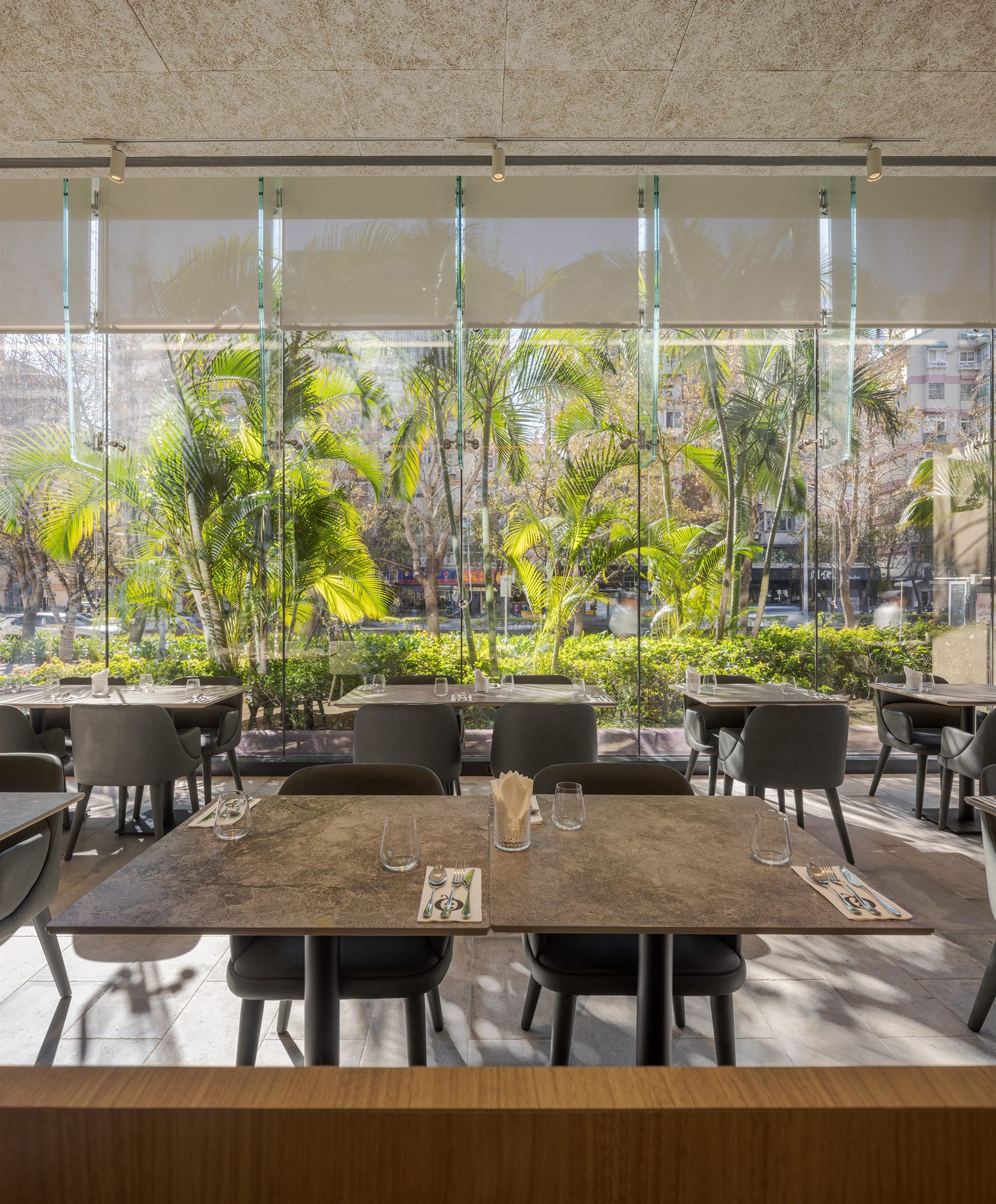 Dining room with a wall of lush planting, ROU × James Sharman, Taipei Marriott