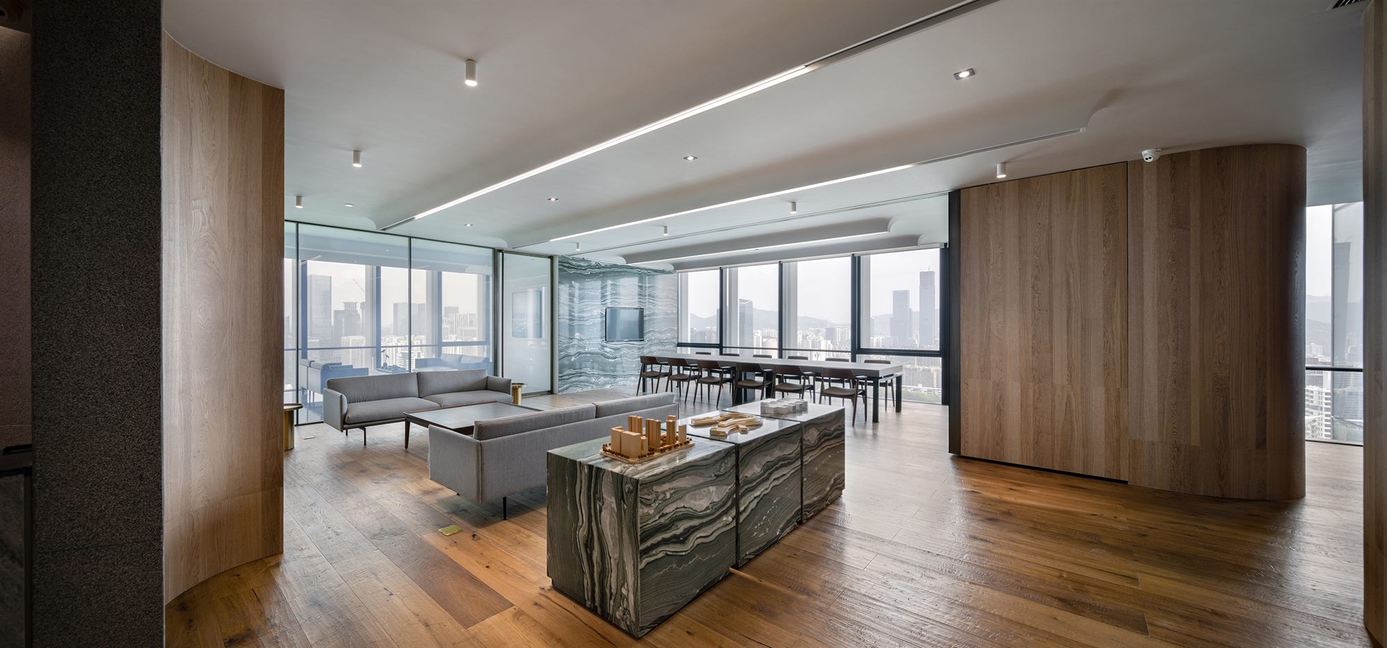 Open-plan office with oak joinery and city views, Shenzhen Wenhua Architectural Construction office